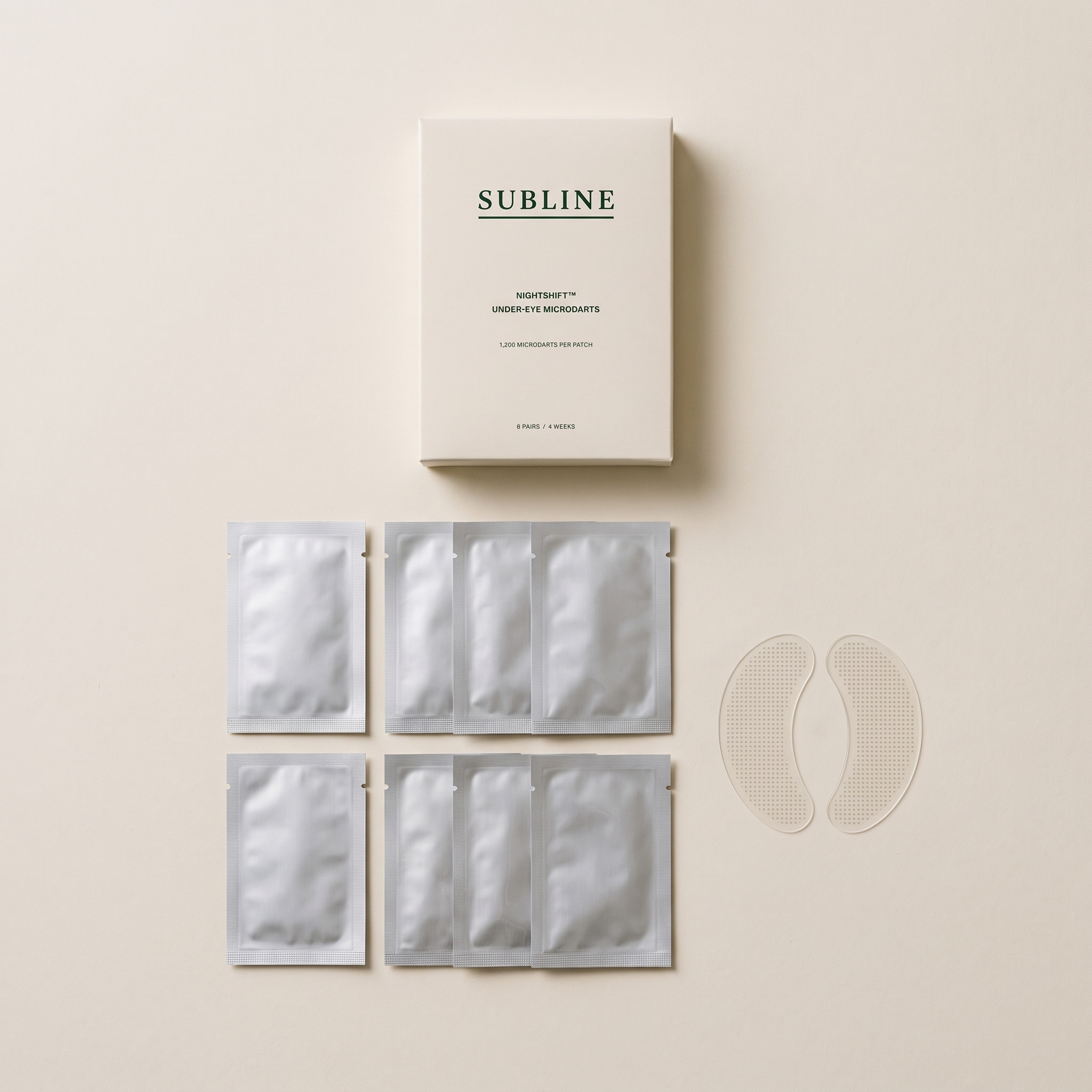 Carton with eight sealed foil sachets and two patches